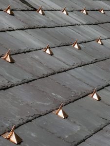 How to manage snow on a slate, metal or tile roof